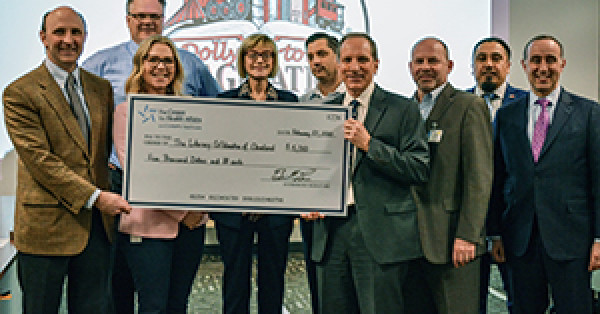 $5,000 Donation to Support The Literacy Cooperative Highlights Commitment to Community: Gift Enables 2,500 Books to be Mailed to Children This Year